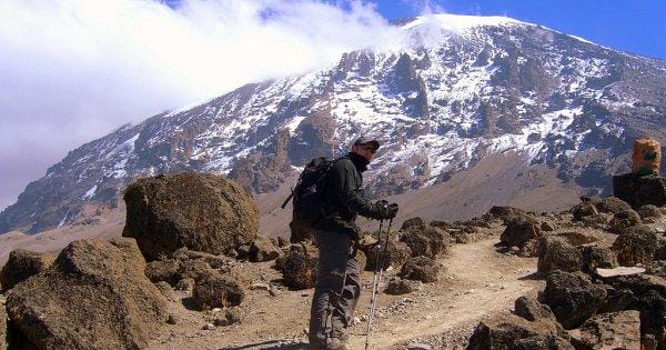 Climbing Mount Kilimanjaro.