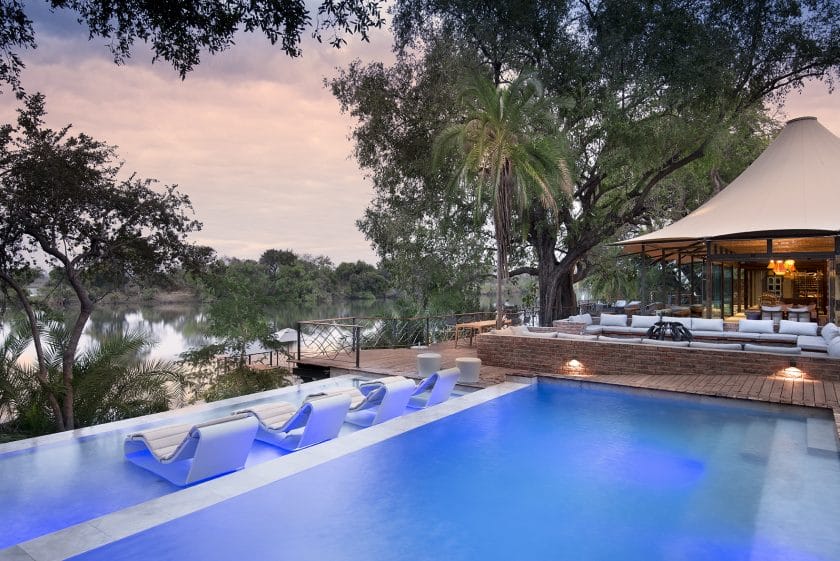 Pool area at luxury lodge in Zambia | Photo credits: Thorntree River Lodge.