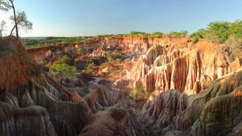 Marafa Depression (Hell's Kitchen canyon) with red cliffs and rocks in afteroon sunset light. Malindi, Kenya
