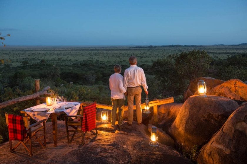 Couples overlooking the Serengeti Plains Credit: Wetu.com