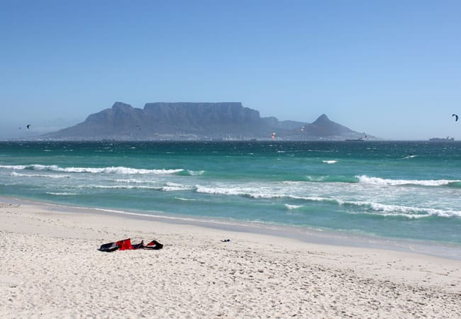 The view of Table Mountain from the Table Bay beaches frames the scene in a picture-perfect postcard.