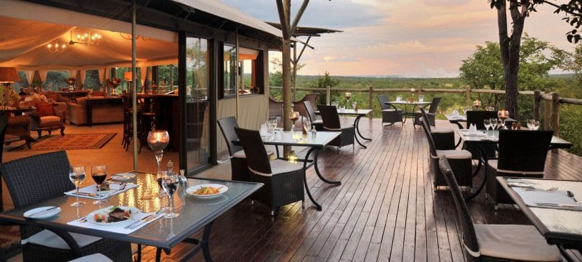 Outdoor dining area at a luxury lodge, Zimbabwe | Photo credits: Victoria Falls Safari Lodge
