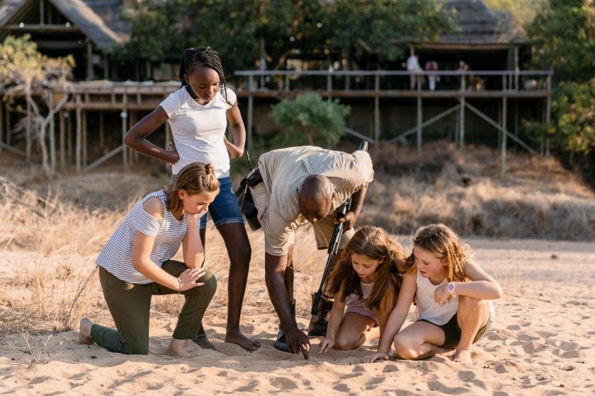 Guides teaching children about Safari