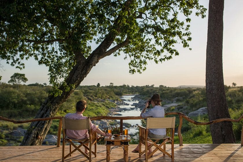 Tourists enjoying the view from the deck at Rekero, Kenya | Photo credit: Rekero