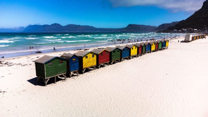 A row of colorful beach houses in Muizenberg Beach, Cape Town, South Africa.