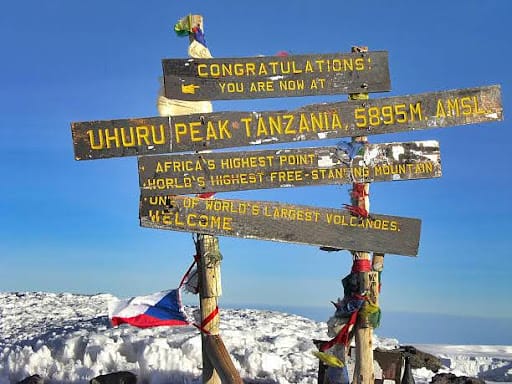Sign at Uhuru Peak on Mount Kilimanjaro, Tanzania.